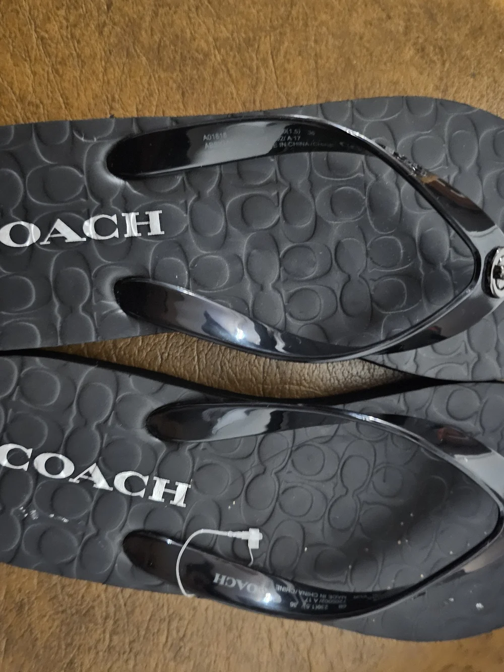 COACH Black Logo Flip Flop Sandals